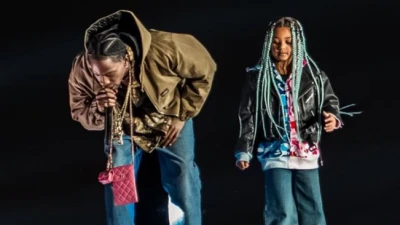 travis scott brings daughter stormi onstage in tokyo as fans celebrate heartwarming moment